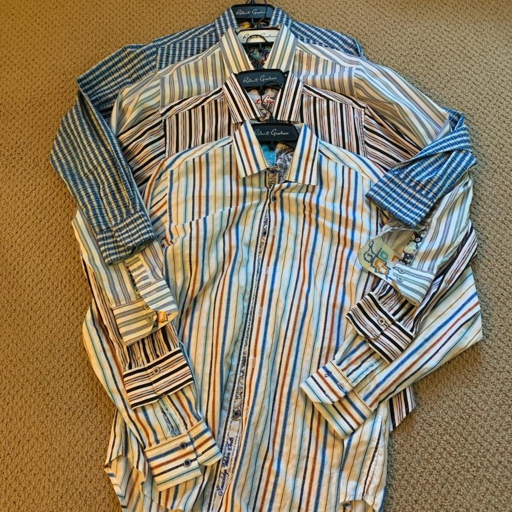 Four medium sized LIKE NEW Robert Graham dress shirts